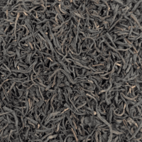 Kenya Milima - Photo du thé noir vu de haut. Feuille bien noires, légèrement bourgeonnées et torsadées.