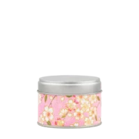 Photo de la petite boîte à thé - fleurs de cerisier : papier washi rose pâle décoré de petites fleurs de cerisier blanches. Boîte ronde, couvercle gris métallisé.