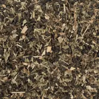 Oolong avant l'orage BIO vu de haut. Oolong assez oxydé en petites voules et feuilles de basilic et menthe.