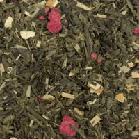 Photo du thé Disco Zeste BIO vu de haut, thé vert parsemé de morceaux de framboise, citronnelle, écorces de citron, hibiscus et menthe.