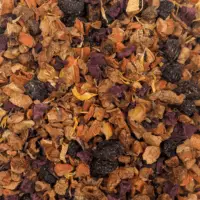 Vue de haut de l'infusion Mangue et Cie BIO montrant les dés de mangue séchée, les raisins et éclats de betterave